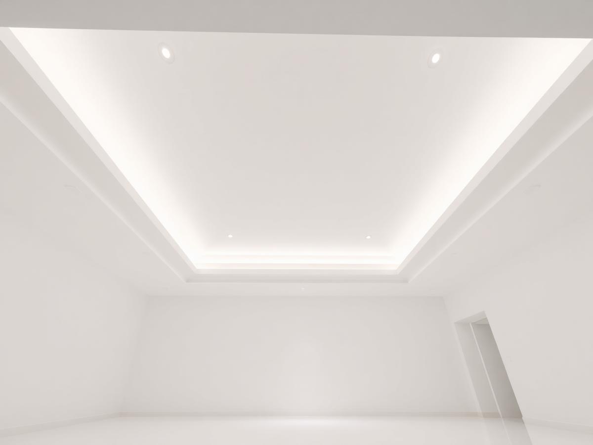 Smooth finished ceiling with recessed lighting